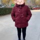 这地方已穿上棉袄了,人们穿着厚厚的棉衣像什么？