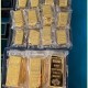 小伙路边捡百万金条,一斤的黄金有100万吗?